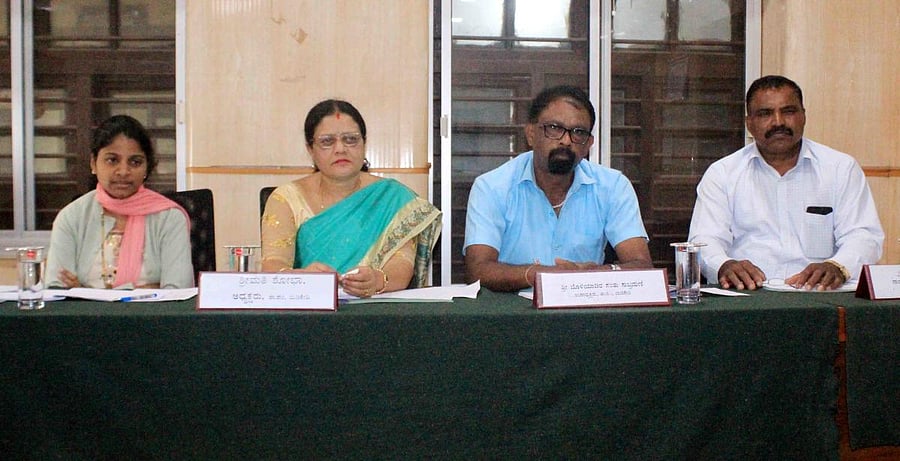 Taluk Panchayat President Tekkade Shobha Mohan chairs taluk panchayat meeting in Madikeri on Saturday.