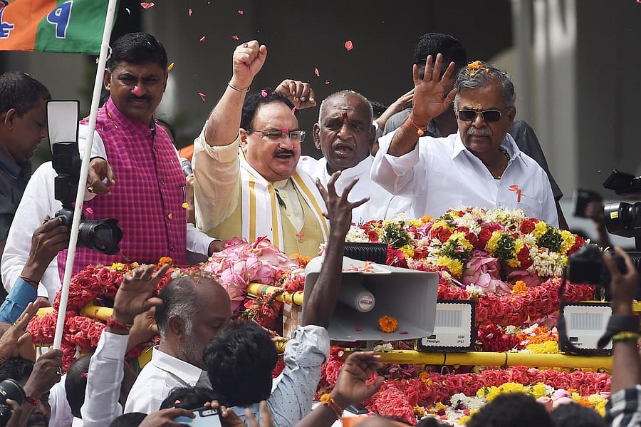 BJP Working President J P Nadda waves at his supporters on his arrival at Chennai airport in Chennai, Saturday, Nov. 30. 2019. PTI 