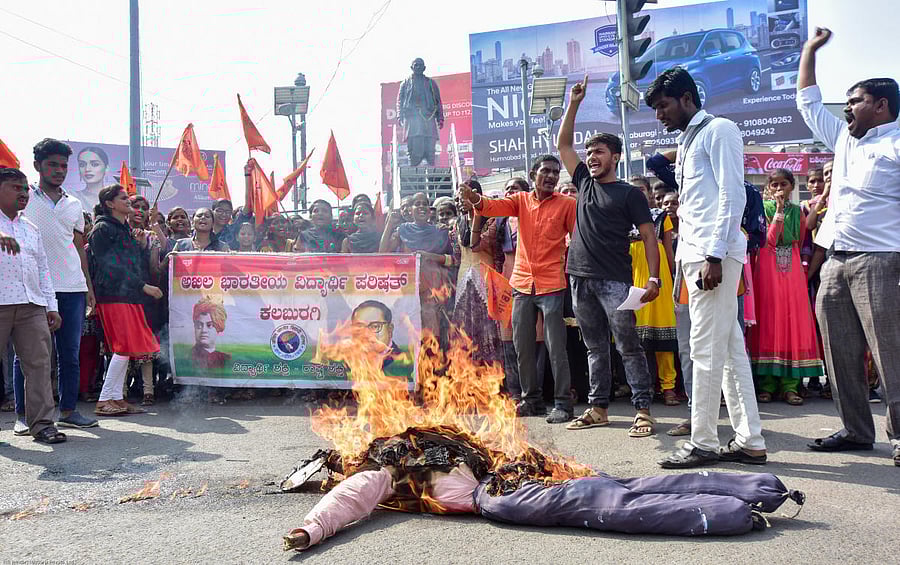 Students, under the banner of ABVP protest rape and murder of a minor at Yakapur village in Chincholi taluk and Hyderabad gang-rape horror, at SVP Circle in Kalaburagi on Wednesday.
