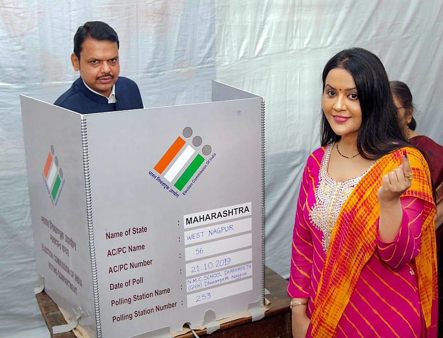 Amruta Fadnavis with husband Devendra Fadnavis (PTI Photo)
