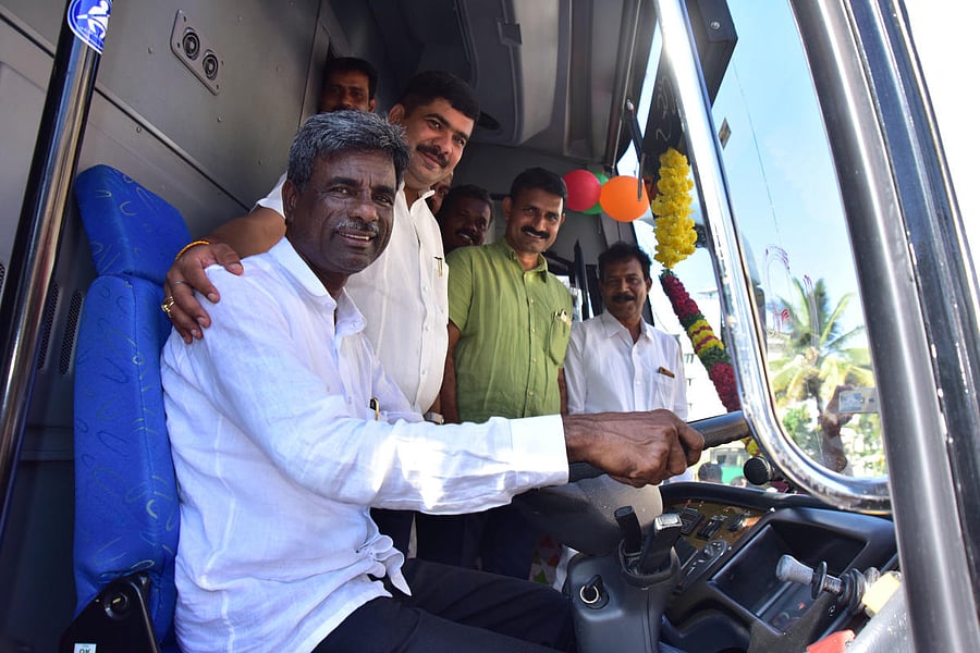 Minister for Muzrai, Inland Port and Fisheries Kota Srinivas Poojary inaugurated Ambari Dream class Multi-axle AC sleeper bus service at KSRTC Bus Stand in Bejai, Mangaluru, on Monday. Mangaluru South MLA D Vedavyas Kamath, Kodialbail ward corporator Sudhir Kumar Kannur and others look on. DH Photo