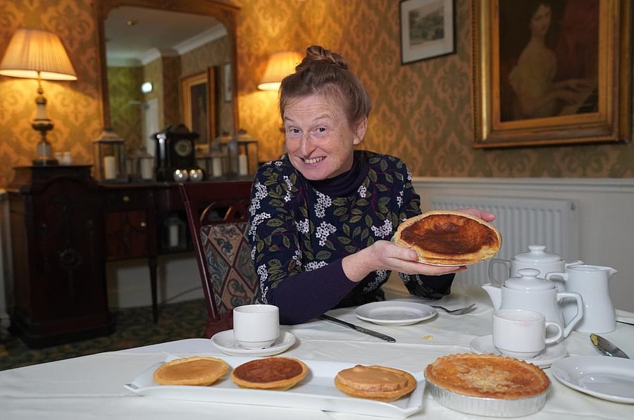 Ruth, the presenter of the show, talks about how certain dishes were invented and popularised.