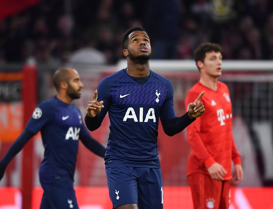 Tottenham Hotspur's English midfielder Ryan Sessegnon celebrates after scoring their first goal during the UEFA Champions League Group B football match between Bayern Munich and Tottenham. (AFP Photo)