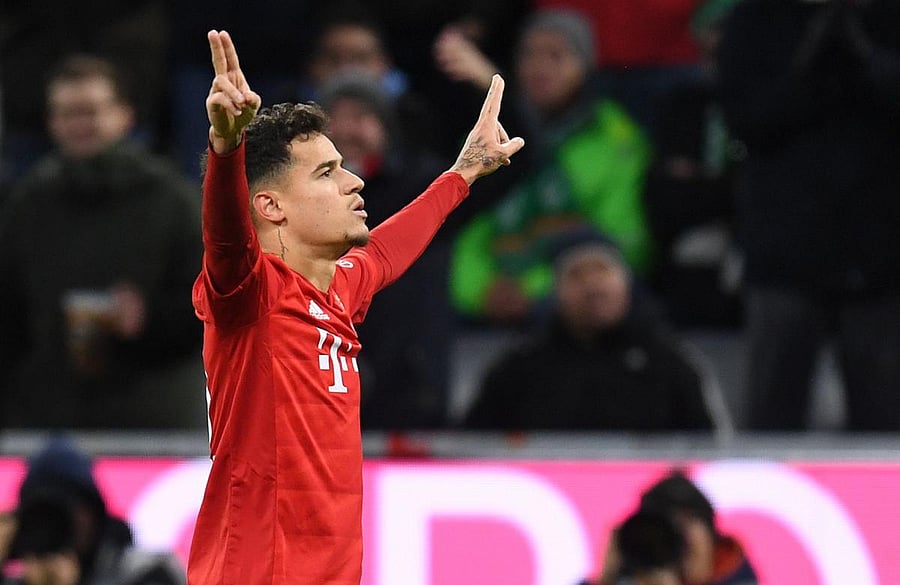 Bayern Munich's Brazilian midfielder Philippe Coutinho reacts after his second goal during the German first division Bundesliga football match Bayern Munich v Werder Bremen in Munich. (AFP Photo)