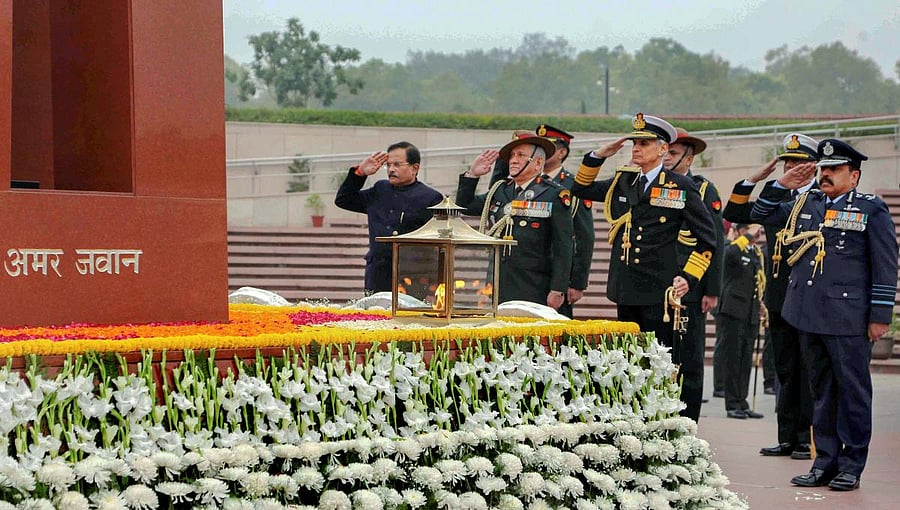 Minister of State for Defence, Shripad Naik, Army Chief General Bipin Rawat, Navy Chief Admiral Karambir Singh and Air Chief Marshal Rakesh Kumar Singh Bhadauria pay homage at the National War Memorial on the occasion of Vijay Diwas. PTI