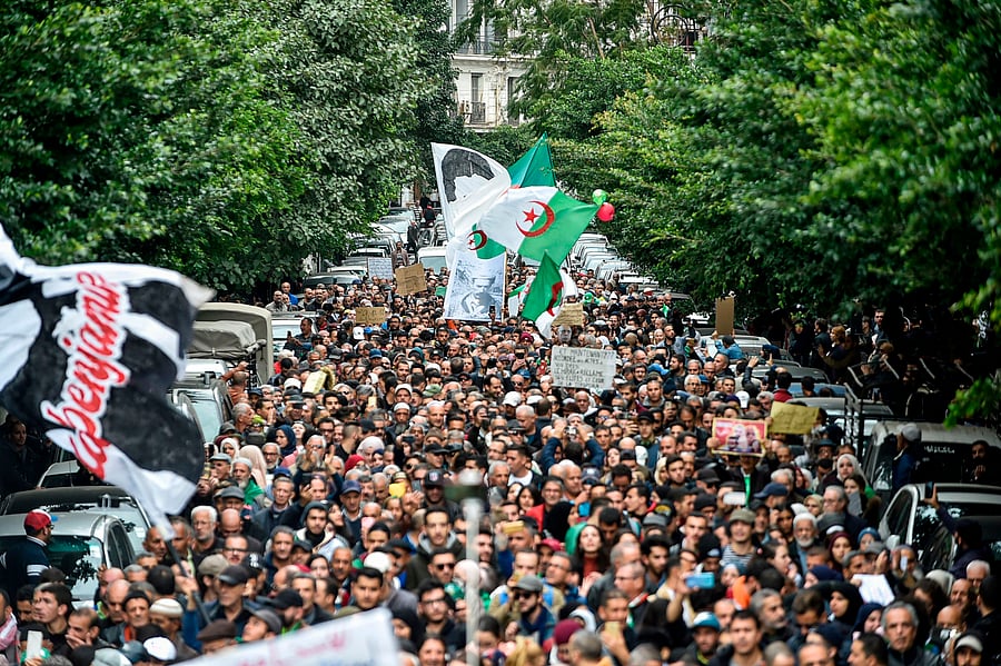 People gather for a mass anti-government demonstration in the centre of the Algerian capital Algiers. (AFP Photo)