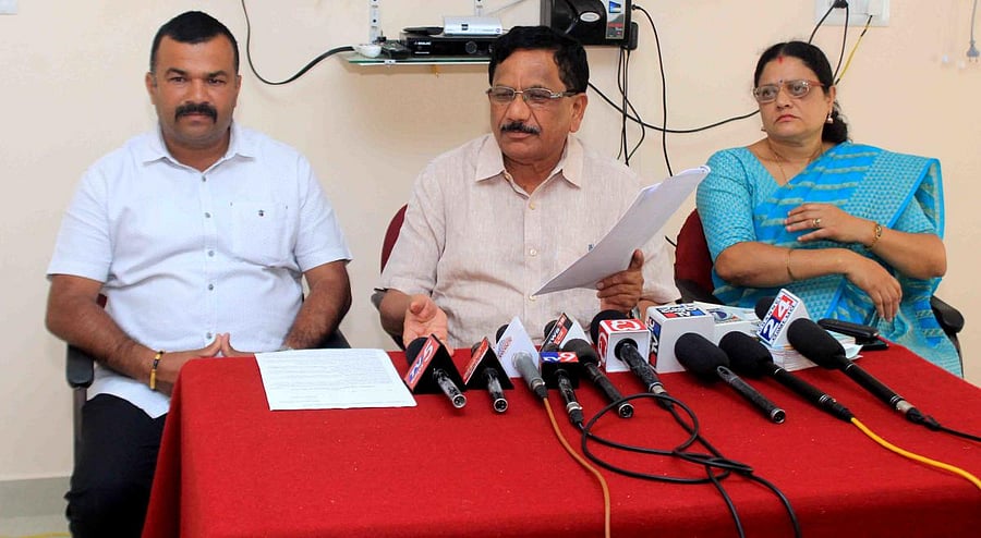 Virajpet MLA K G Bopaiah addresses a press meet in Madikeri on Thursday. DH Photo
