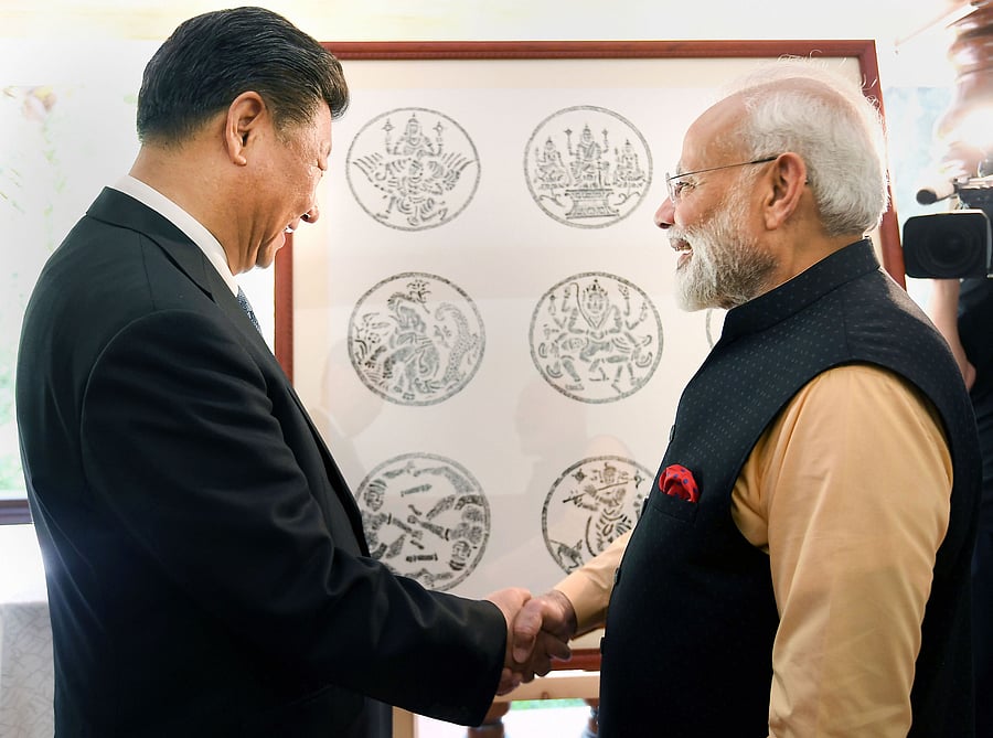 Prime Minister Narendra Modi with Chinese President Xi Jinping, at Fisherman's Cove in Kovalam near Mamallapuram. (Reuters Photo)