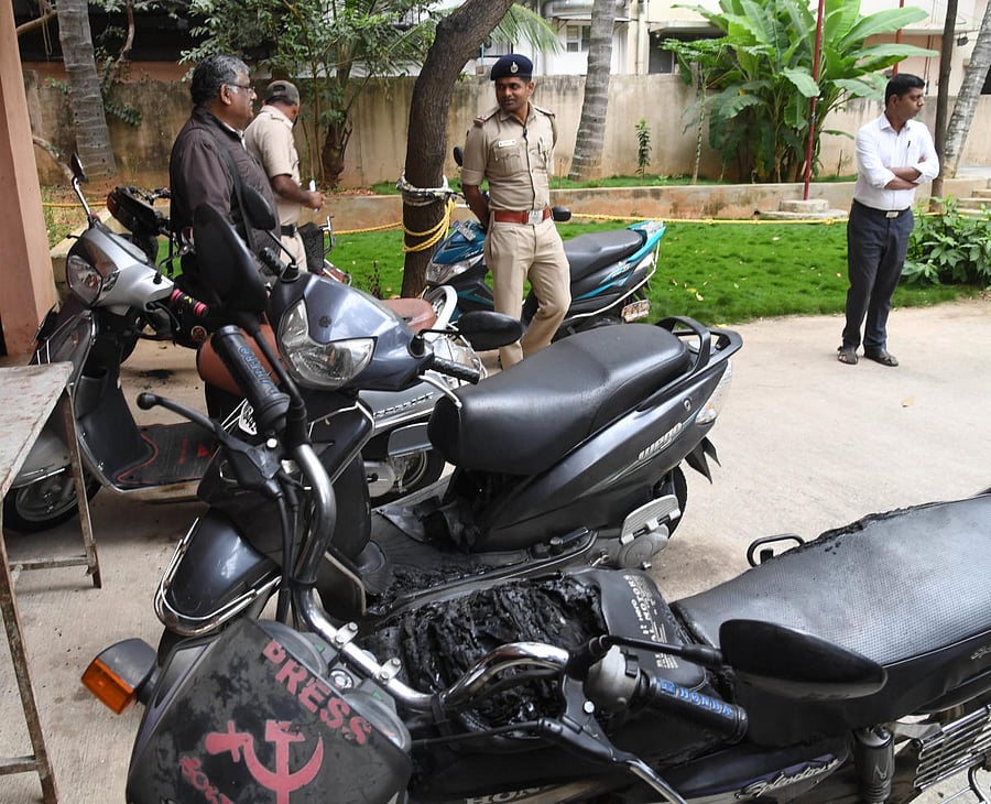 One of the vehicles set afire at the CPI office in Bengaluru in the wee hours of Wednesday. dh photo-