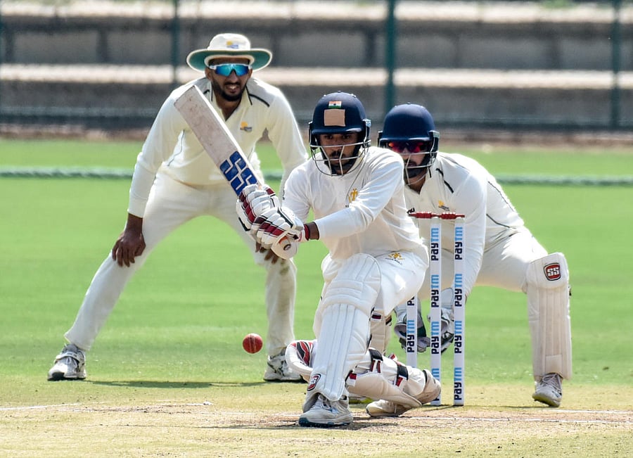 Karnataka's BR Sharath attempts to sweep during his 42-run knock against Himachal Pradesh on Saturday. DH PHOTO/ SAVITHA BR