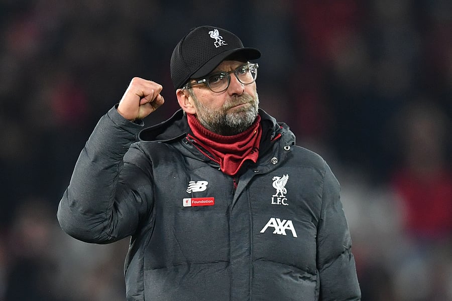Liverpool's German manager Jurgen Klopp gestures at the end of the English Premier League football match between Liverpool and Wolverhampton Wanderers at Anfield in Liverpool. (AFP Photo)
