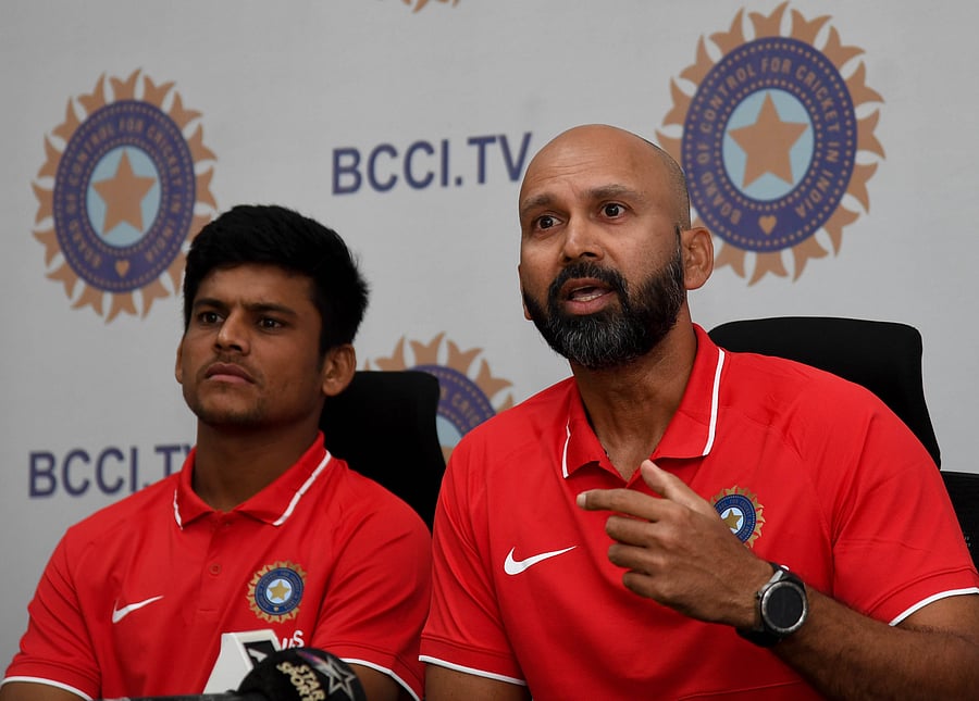 Head Coach(Right) and Priyam Garg, Captain of Indian Team Under-19 Cricket are seen during the Pre-departure press conference on World Cup 2020. (DH Photo)