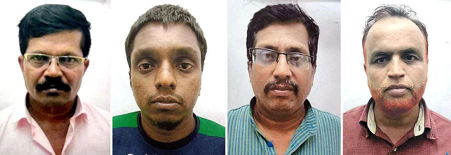 The arrested postal employees, Vijay Rao, Subba, T R Ramesh and Syed Majid. SPECIAL ARRANGEMENT