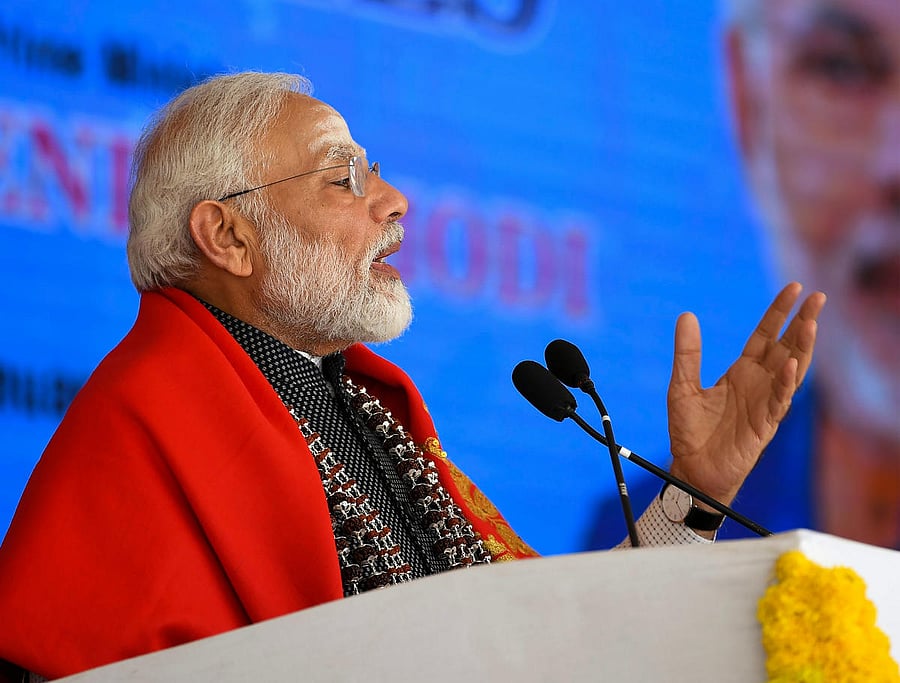 Prime Minister Narendra Modi addresses at the foundation stone laying ceremony for memorial museum of His Holiness Sree Sree Sree Sivakumara Swamigalu in Siddhaganga Mutt, at Tumkuru. PTI