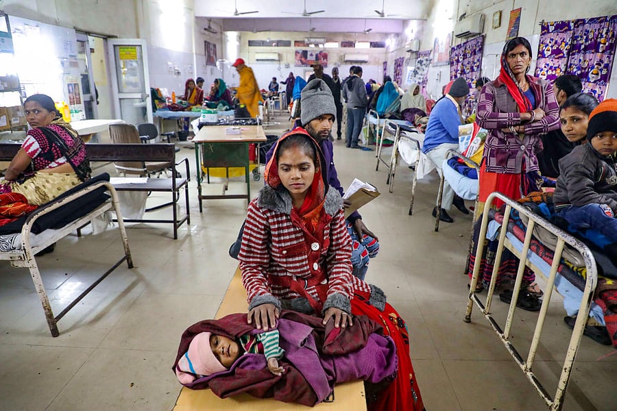  A mother waits for treatment of her child at the JK Lon hospital, in Kota district, Thursday, Jan. 2, 2020. At least 100 infants have died at a government-run hospital in Kota in the past month. (PTI Photo) 