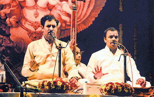 Malladi brothers perform at a music concert.
