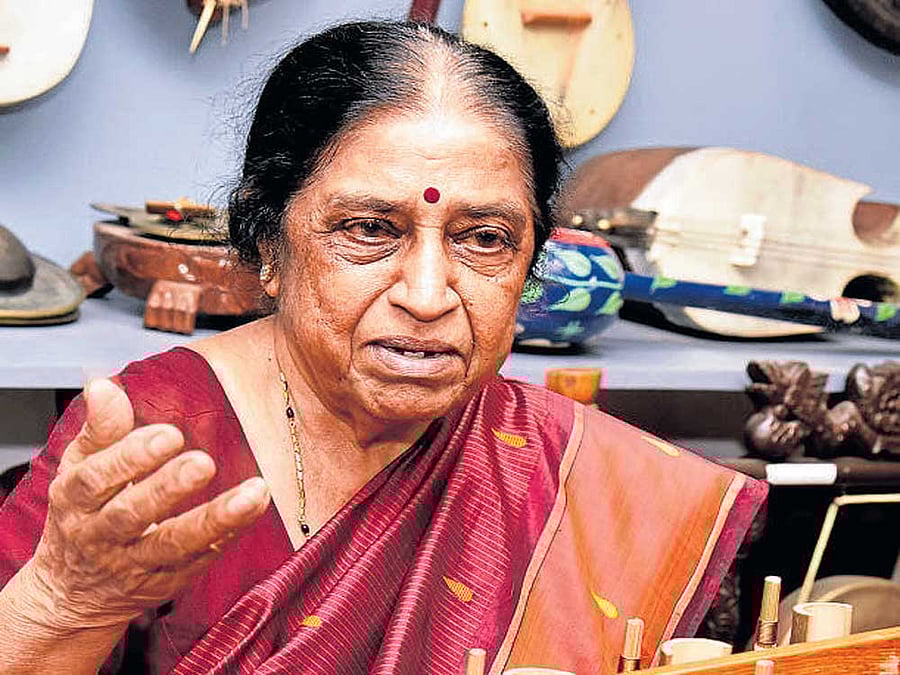 unique display Anasuya Kulkarni has a collection of around 300 musical instruments from different parts of the world;  (right) Anasuya with ankrang, a bamboo instrument she developed. DH PHOTOS BY S K DINESH