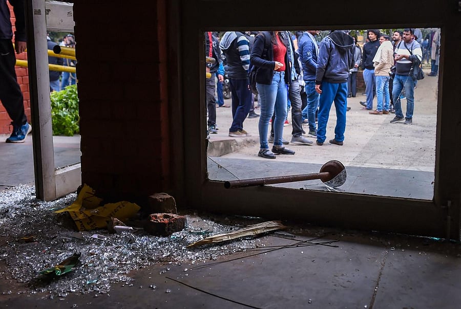 Broken glass at the Sabarmati Hostel following Sunday's violence at the Jawaharlal Nehru University (JNU) , in New Delhi, Monday, Jan. 6, 2020