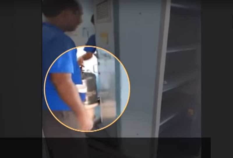 Train catering service vendors collect water for tea from toilet. (Video grab from the viral video via ANI)