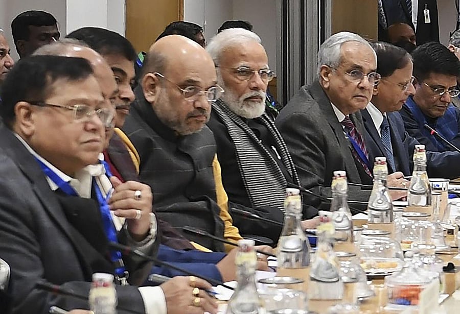 PM Modi meets economists and experts in a meeting at NITI Aayog. PTI