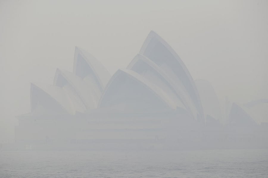 Thick smoke from wildfires shroud the Opera House in Sydney, Australia, Tuesday, Dec. 10, 2019. Hot dry conditions have brought an early start to the fire season. AP/PTI
