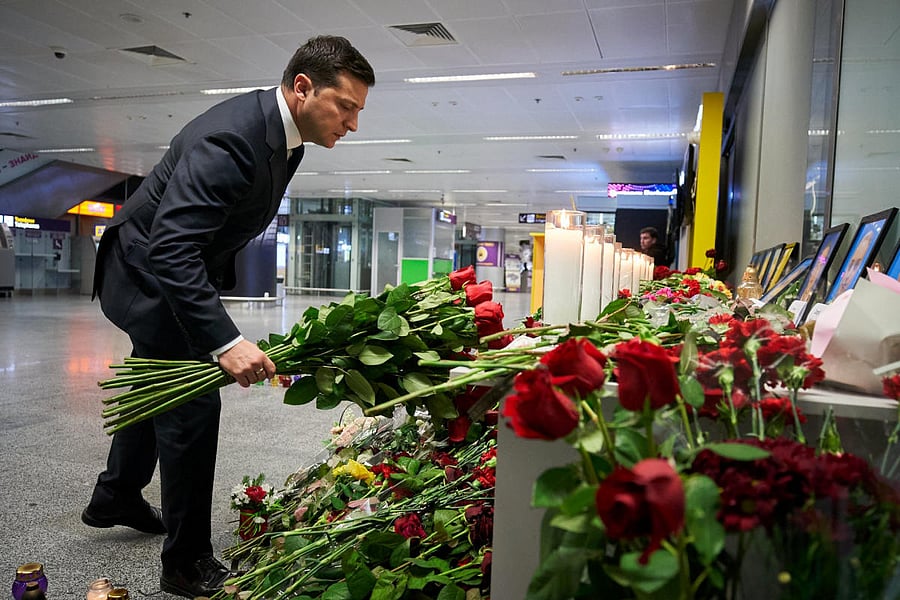 Ukrainian President Volodymyr Zelenskiy lays flowers to commemorate victims of the Ukraine International Airlines Boeing 737-800 plane crash, at a memorial in Boryspil International Airport. (Reuters Photo)