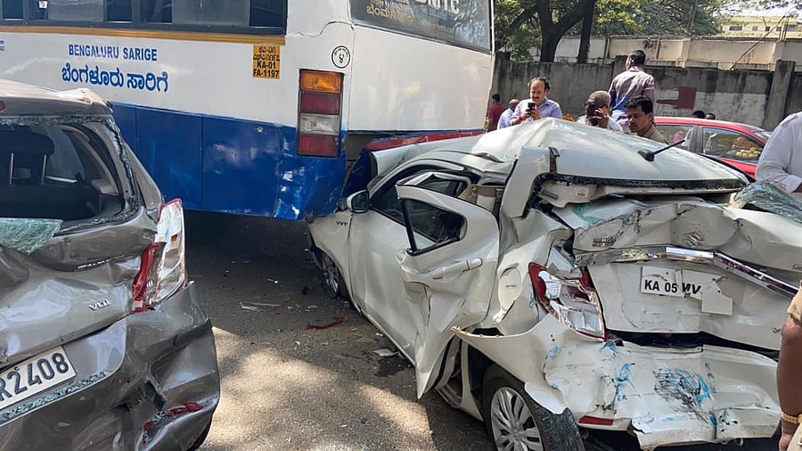 Mangled remains of the cars damaged in the accident in Jayanagar on Friday. DH Photo
