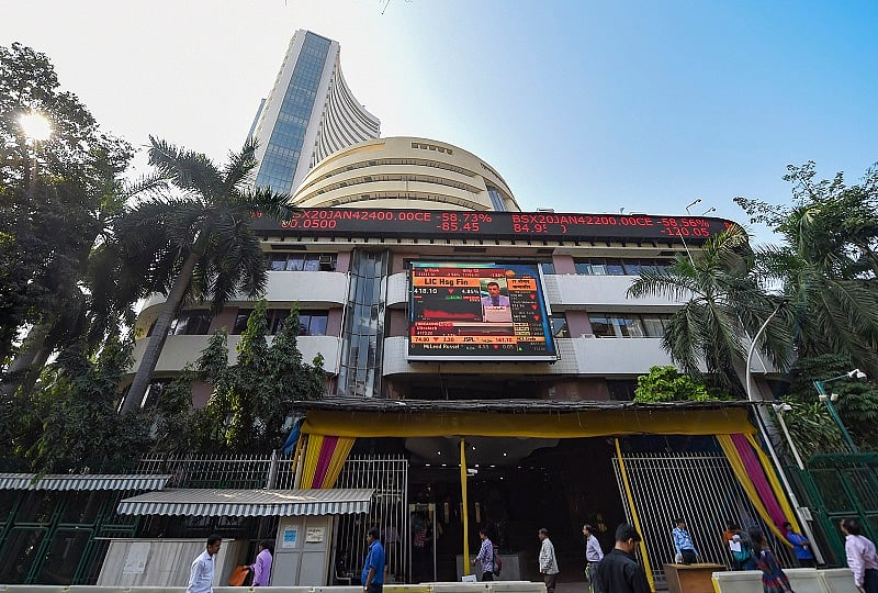 A view of the stock prices displayed on a digital screen outside BSE building in Mumbai. (PTI Photo)