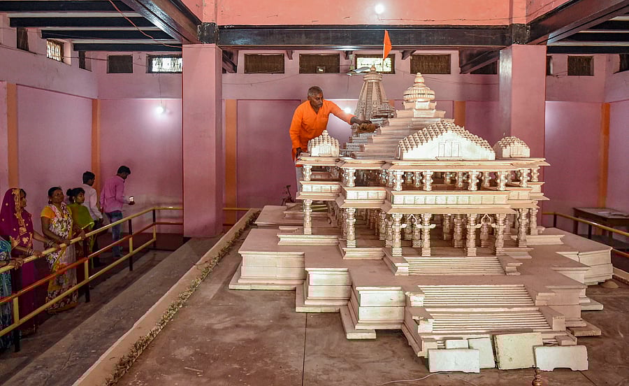 Replica of the proposed Ram Mandir on display at Karsewakpuram, in Ayodhya, Monday, Nov. 11, 2019. (PTI Photo)