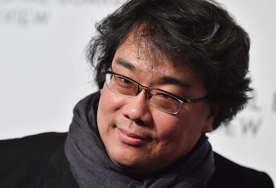 "Every time they announced the new nominations, it was so thrilling, because we didn't really anticipate any of this," Bong said, referring to nominations garnered by his movie 'Parasite'. (AFP Photo)