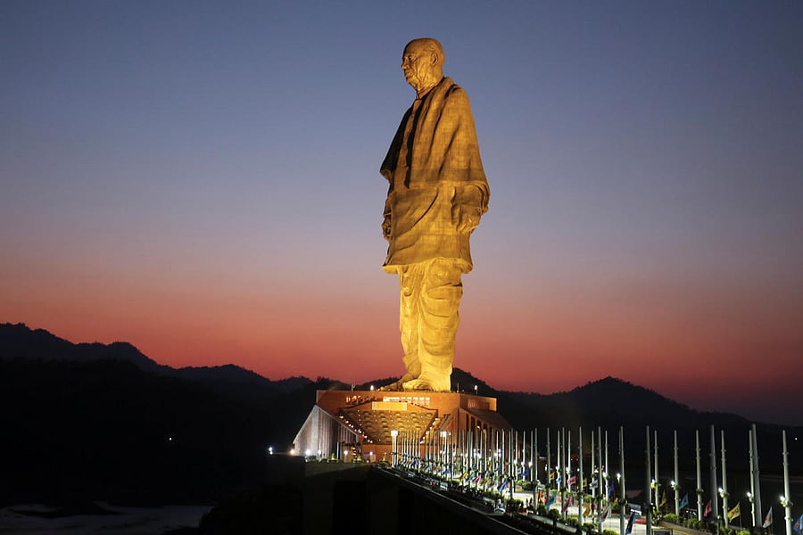 The towering 182-metre statue is at the Sardar Sarovar Dam in Kavadia, Gujarat. (PTI Photo)