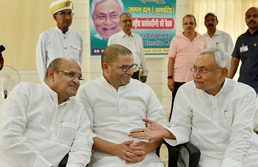 Bihar Chief Minister and Janata Dal United JD(U) National President Nitish Kumar along with party Vice President Prashant Kishor and Secretary General KC Tyagi. (PTI Photo)