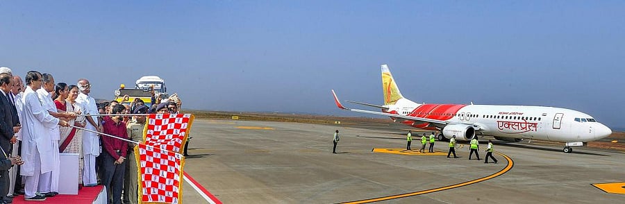Civil Aviation Minister Suresh Prabhu and Kerala Chief Minister Pinarayi Vijayan flag off the first flight during the inaugural ceremony of Kannur International Airport. (PTI PHOTO)