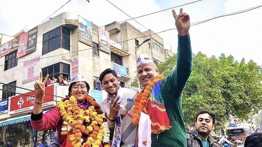 Delhi Deputy CM Manish Sisodia and AAP leader Atishi Marlena during an election campaign for State Assembly elections in New Delhi. (PTI Photo)