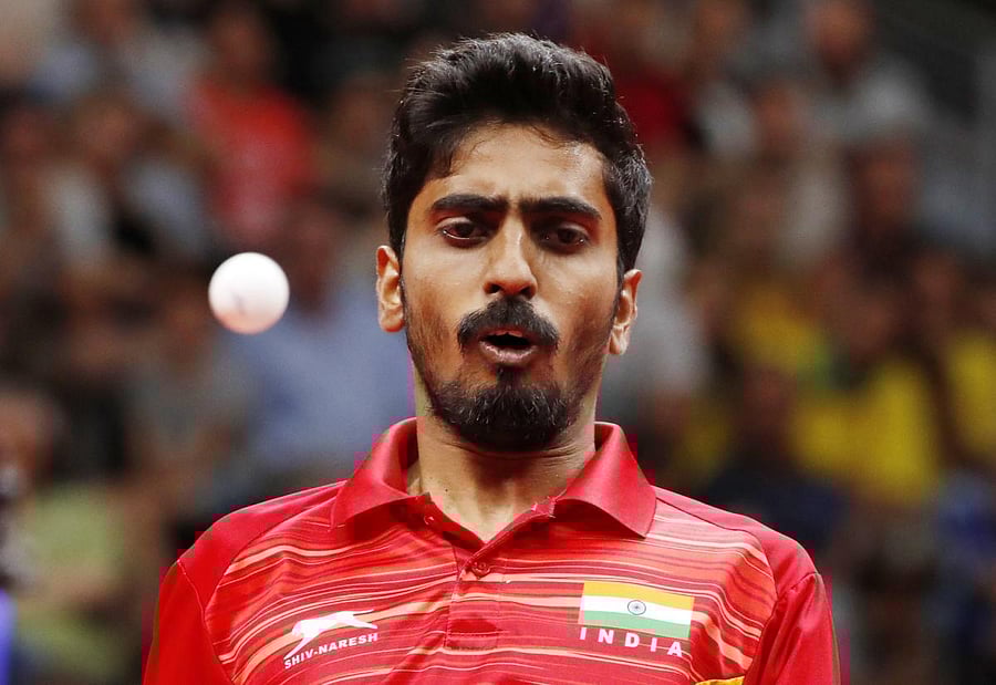 India's men's highest-ranked player G Sathiyan took some time adjusting to the pimpled rubber of Luka Mladenovic but other than that it was a straight forward tie for the fifth seeds who play 11th seeds Slovenia in the all-important round of 16 clash here on Friday. Credit: Reuters