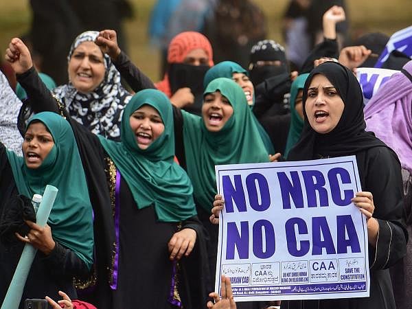 Women protesters shout slogans during a demonstration against CAA, NRC, NRP in Bengaluru, Saturday, Jan. 18, 2020. (PTI Photo)