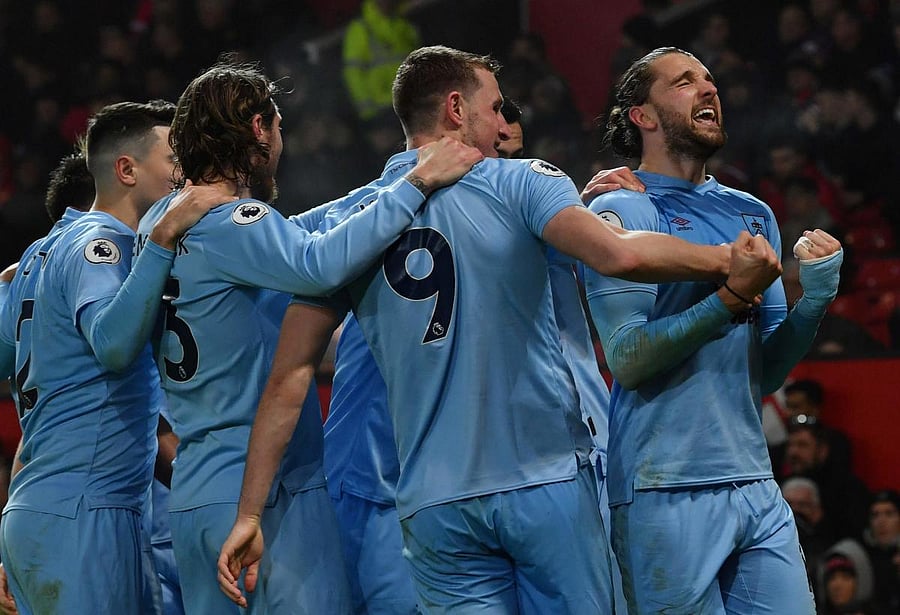 Burnley’s Jay Rodriguez (right) celebrates after scoring against Manchester United on Wednesday. AFP