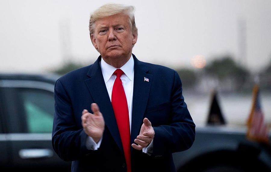 US President Donald Trump disembarks from Air Force One upon arrival at Miami International Airport in Miami, Florida, January 23, 2020, as he travels to speak at the Republican National Committee Winter Meeting. (AFP Photo)