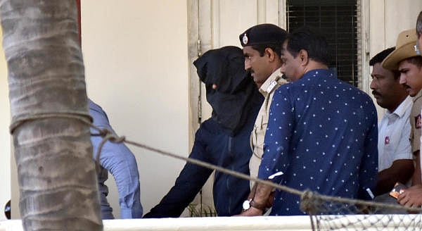 Mangalore Police takes Mangaluru airport bomb suspect Aditya Rao rom Halasuru Gate police station in Bengaluru on Wednesday, January 22, 2020. (DH Photo)