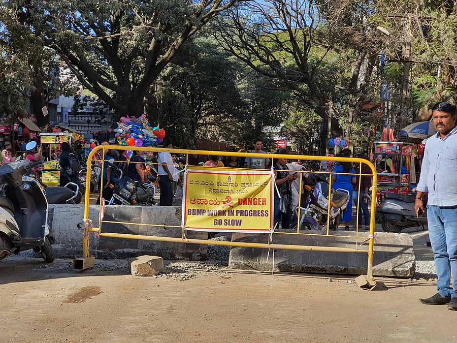 A ‘tenant’ pays between Rs 750 and Rs 1,000 a day as rent for a 6 ft by 8 ft booth installed on a footpath. Photo by S K Dinesh
