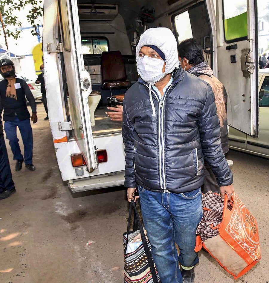  A student who arrived from China, proceeds to Patna Medical College and Hospital for a check-up. (PTI Photo)