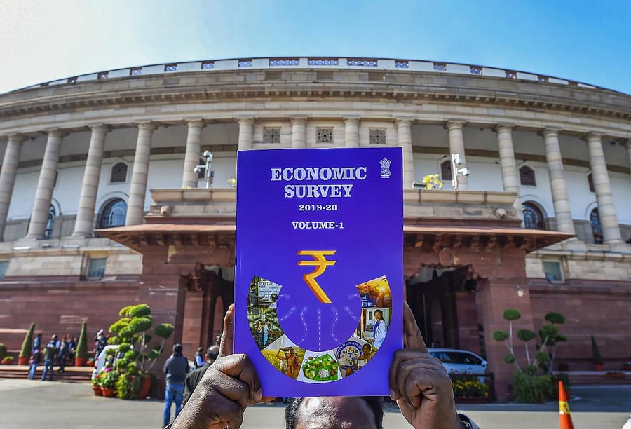 of the first volume of Economic Survey 2019-20 which was tabled in Parliament on the first day of the Budget Session, in New Delhi, Friday, Jan. 31, 2020. (Credit: PTI Photo)