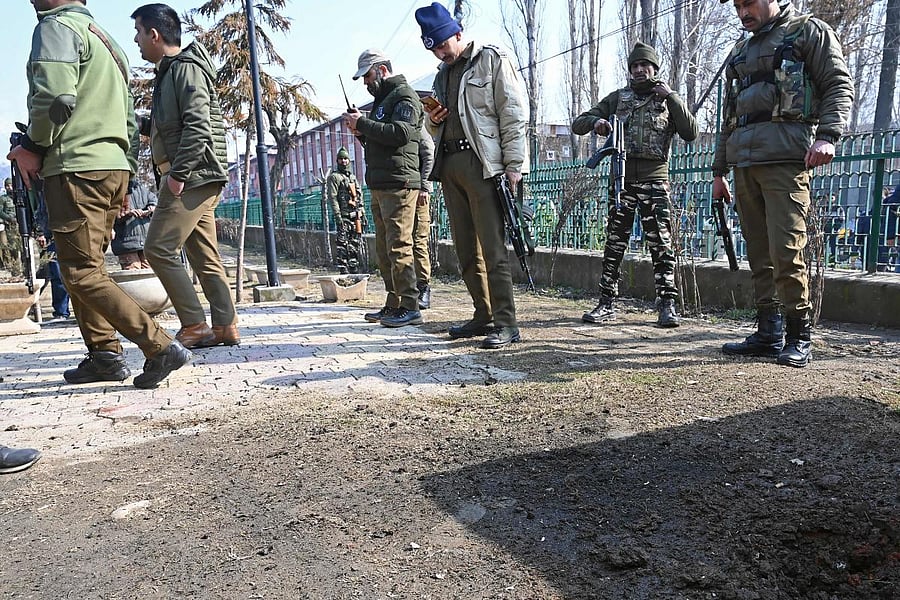 Indian government forces stand near a site following a grenade blast in Srinagar (AFP Photo)