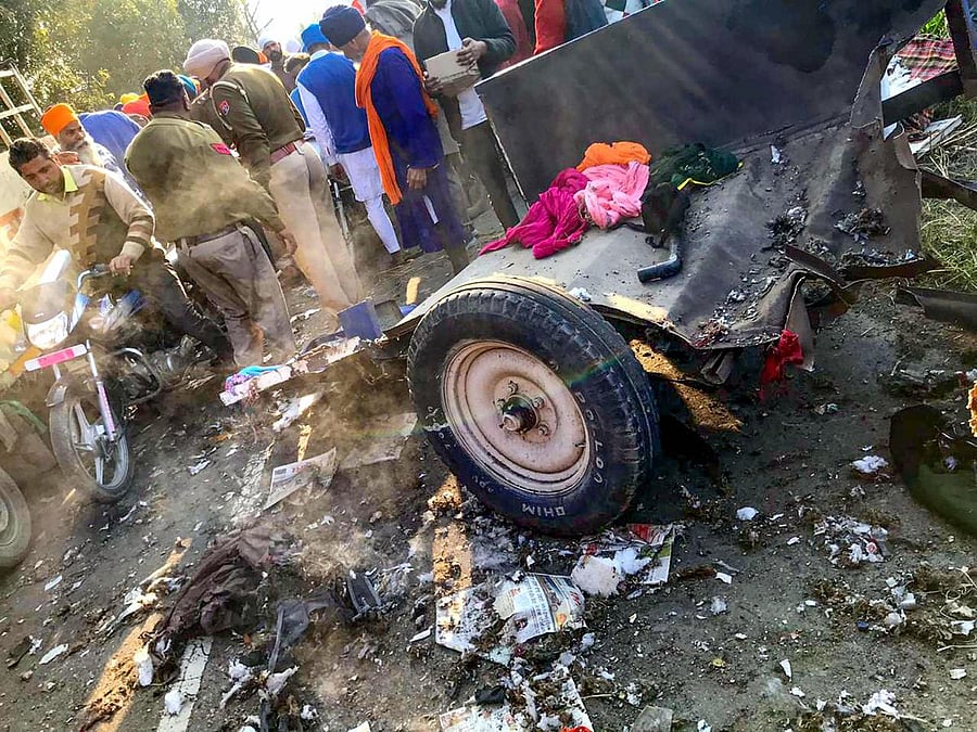 Police personnel investigate at the site of an explosion which occurred during a 'Nagar Kirtan' religious procession near Pahu village in Tarn Taran district, Saturday, Feb. 8, 2020. Two people were killed and 11 injured in a firecracker explosion. (PTI Photo)