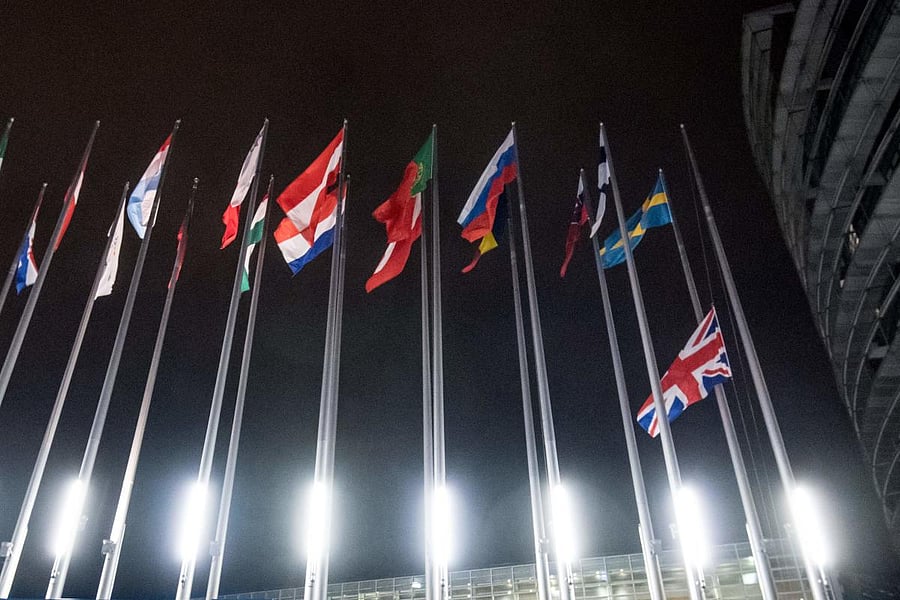 This photograph taken on January 31, 2020, shows a Union flag from the United Kingdom Representation as it is lowered from a flagpole at The European Parliament, in Strasbourg, on Brexit Day. AFP