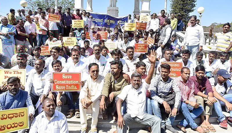 Members of Constitution Protection Committee stage a protest, seeking withdrawal of sedition case against a student, who displayed 'Free Kashmir' placard', in Mysuru. (DH Photo)