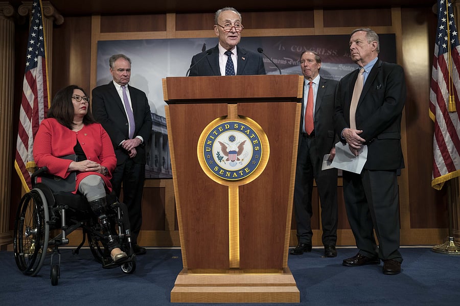 U.S. Minority Leader Sen. Chuck Schumer (D-NY) speaks during a news conference following the bipartisan Senate vote on the War Powers Resolution on Iran with Senators Tammy Duckworth (D-IL), Tim Kaine (D-VA), Tom Udall (D-NM) and Dick Durbin (D-IL) at the U.S. Capitol. (AFP Photo)