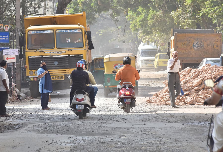 Ongoing road work, unregulated construction and disappearing green cover have contributed to rising pollution levels in the city. (Above) A dug up and dusty road at Seshadripuram. dh photos by Janardhan B K