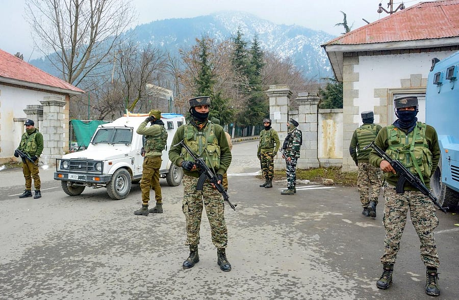 Security personnel stand guard outside the hotel where 25 European Union Parliamentarians were staying and meeting people during their visit to assess the ground situation in Valley after the abrogation of Article 370, in Srinagar, Wednesday, Feb. 12, 202