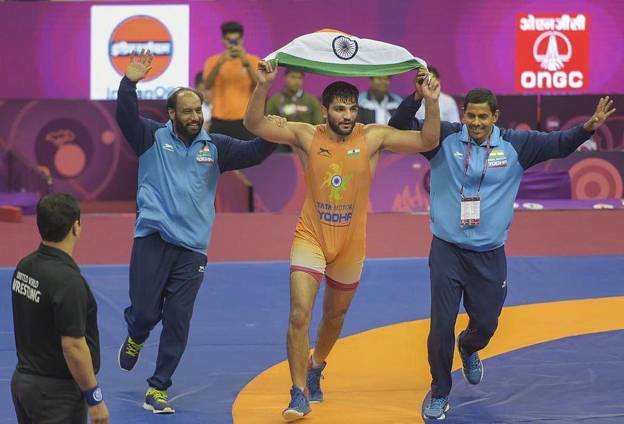 India's Sunil Kumar celebrates after his win against Salidinov Azat (KAZ) in the final of 87kg category wrestling match during the Asian Wrestling Championship 2020. PTI
